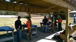 UMASS students and Range Safety Officers on the rifle range
