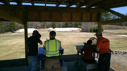 UMASS students and Range Safety Officers on the rifle range